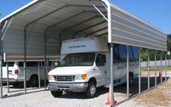 Extra space to park a large vehicle with tall sides and extra room to spare.